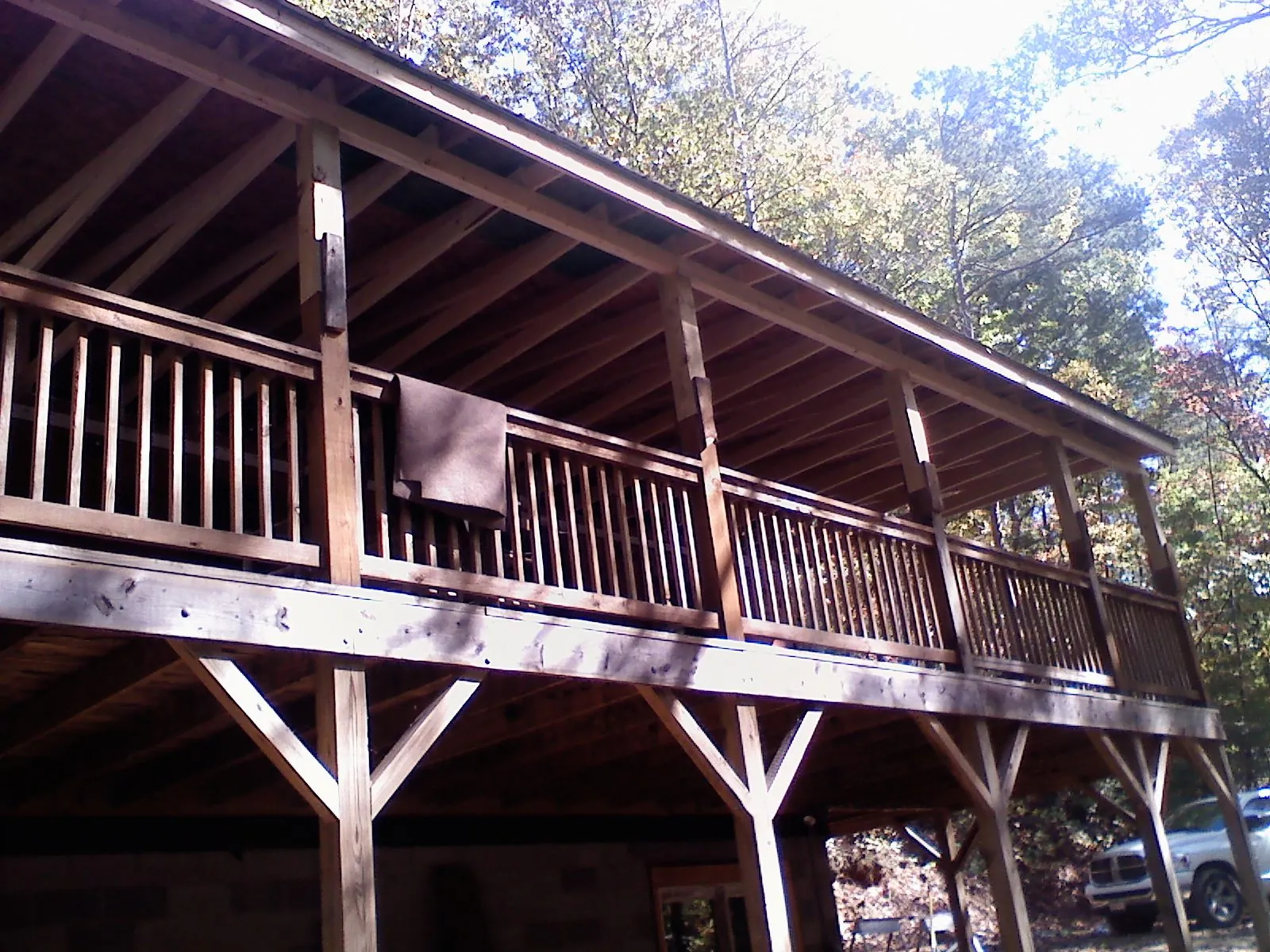 Timber framing under a new elevated porch and deck — Roof Leak Repair in Sylvan Beach by Roofing Brothers